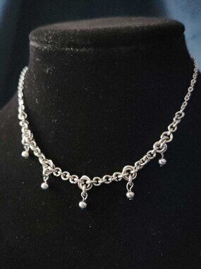 Gothic silver chainmaille necklace with a small silver chain